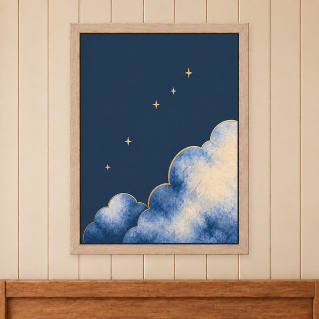 Moonrise Clouds and Stars Print in a natural wood frame above a timber bed headboard on a cream panelled wall.