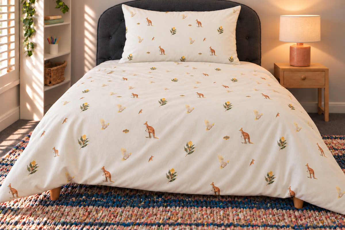 Bush Picnic duvet cover in the existing room, with its ivory wildlife print unobscured; coordinated pillowcase shown separately.