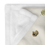 Mosswood Trail Throw, folded view with the light reverse visible.